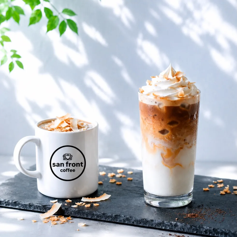 Photo by san front coffee in 月島もんじゃストリート with @san_front_coffee. May be an image of coffee cup, coffee, cappuccino and text that says 'አ san sanfront front coffee'.