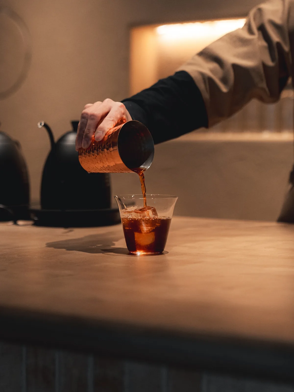 Iced filter coffee being served at KURO MAME Tokyo.