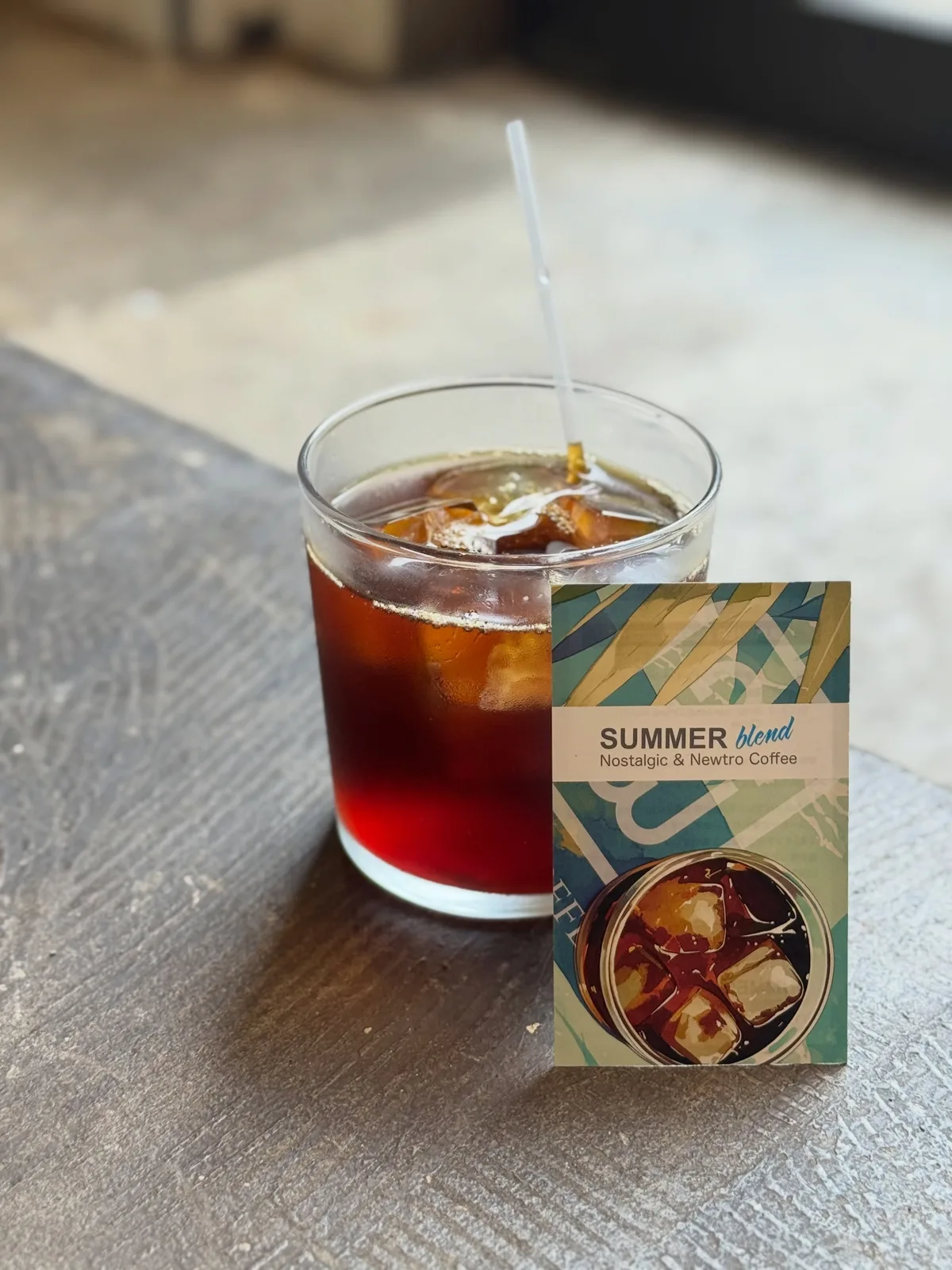 Photo by 𝐥𝐢𝐭 𝐜𝐨𝐟𝐟𝐞𝐞 & 𝐭𝐞𝐚 𝐬𝐭𝐚𝐧𝐝 on June 02, 2026. May be an image of drink, cornflower and text that says 'SUMMER SUMMERblend blend Nostalgic Nostalgic&NewtroCoffiea & Newtro Coffea'.
