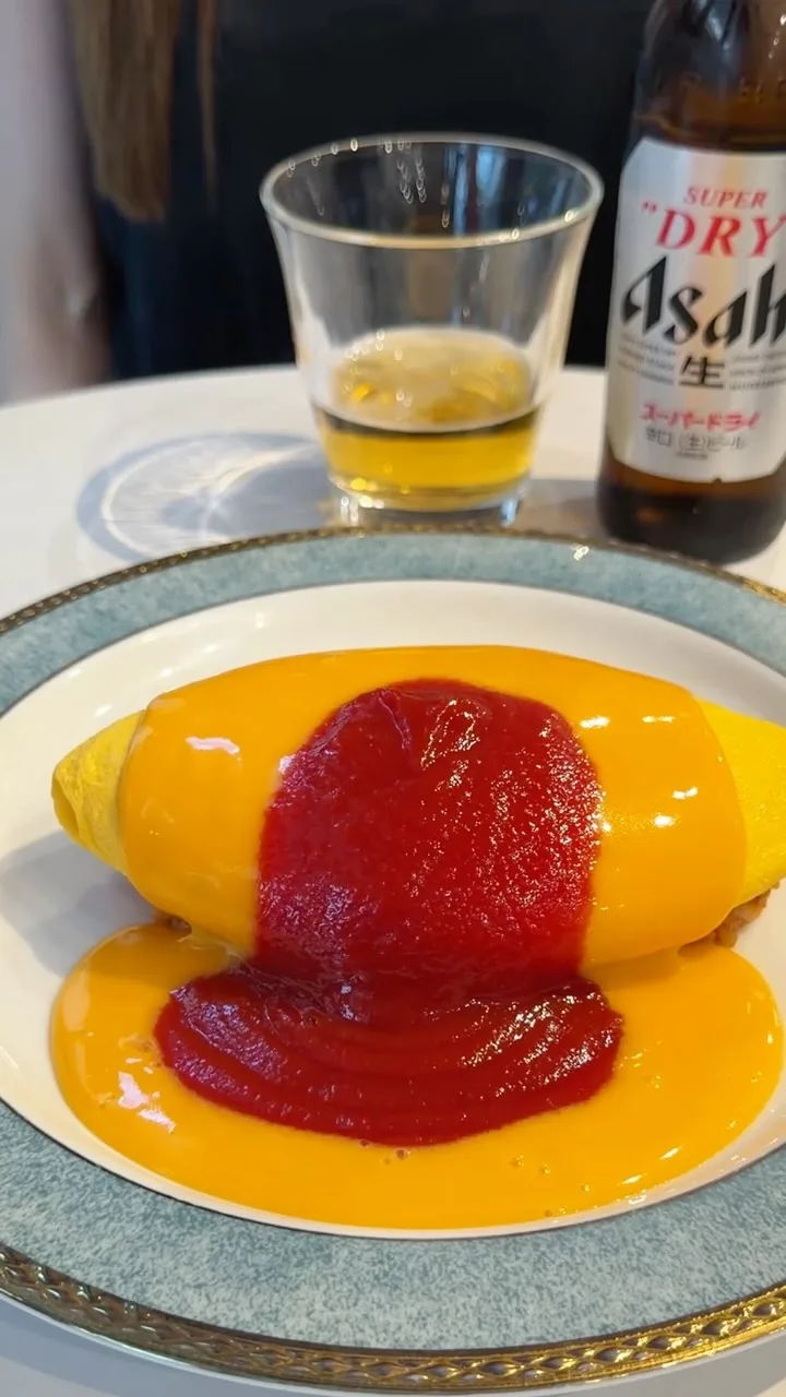What’s better than a fluffy omurice? 🍳

A fluffy omurice with an ice-cold Japanese beer. 🍺

━━━━━━━━━━━━━━

“Japan’s No.1 omurice chef — only in Tokyo.”‼️

The famous “Pakkān” Omurice
by Japan’s No.1 omurice chef
can be experienced only here in Tokyo.🌈

A fluffy omelet
opens right in front of your eyes — pakkān.✨

An omurice you don’t just eat,
but enjoy with all five senses.

A serious collaboration between true specialists.
🍳 Omurice professional ( @omuraisupuro )
🥩 Famous yakiniku restaurant Hirokiya ( @dj_hiroki_ )

Perfectly paired with our rich Basque cheesecake.🧀

📍 3-minute walk from Omotesando Station (behind Qu’il Fait Bon)
🕚 11:00–20:00 (Open daily)
📞 03-6447-4575
❌ No reservation needed

━━━━━━━━━━━━━━

日本1になったオムライス職人の
「ぱっかーんオムライス」
が食べれるのは東京でここだけ‼️

ふわふわオムレツを
お客様の目の前で、ぱっかーん🌈

五感で楽しめるオムライスがここにあります✨

卵と肉のスペシャリストが本気でタッグ。
🍳 オムライスのプロ（ @omuraisupuro ）
🥩 焼肉の名店 ヒロキヤ（ @dj_hiroki_ ）

濃厚バスクチーズケーキと一緒にどうぞ🧀

📍 表参道駅 徒歩3分（キルフェボン裏）
🕚 11:00〜20:00（年中無休）
📞 03-6447-4575
❌ 予約不要