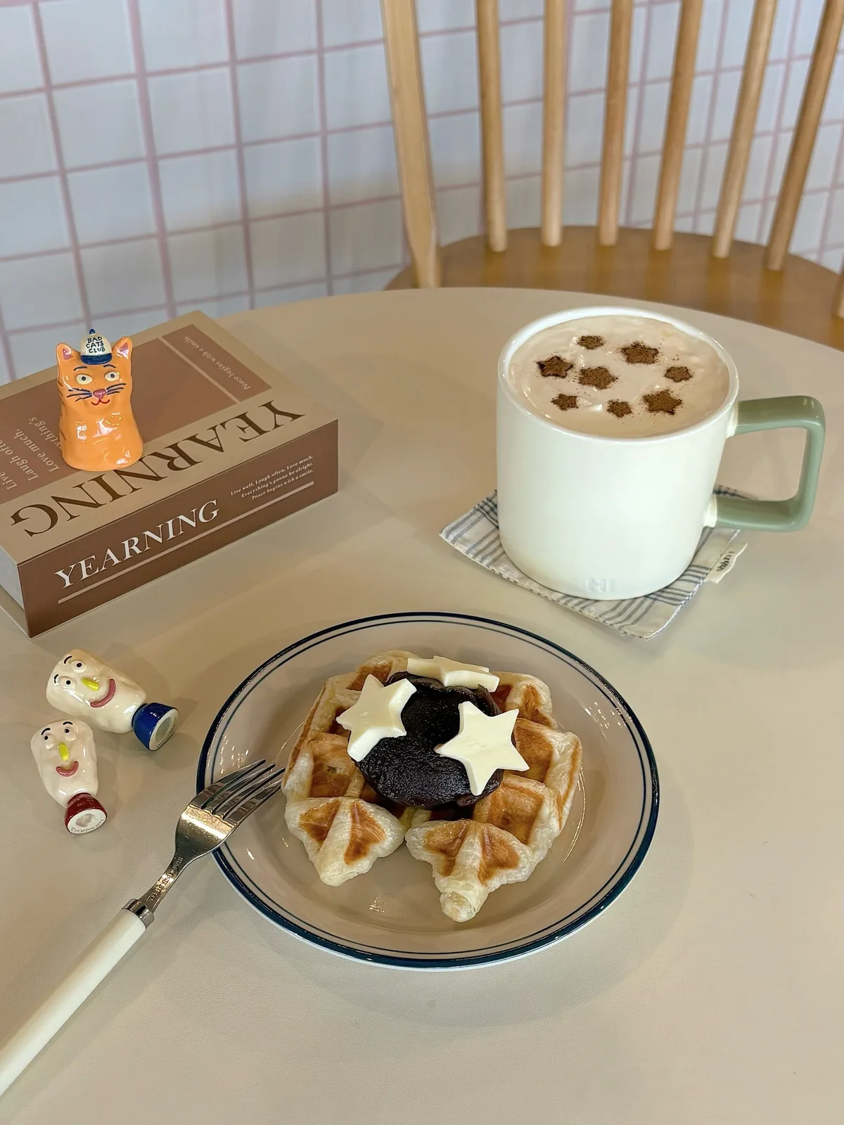 Photo by __nuibox on July 28, 2026. May be an image of coffee, coffee cup, whipped cream, blueberries, pancake and text.