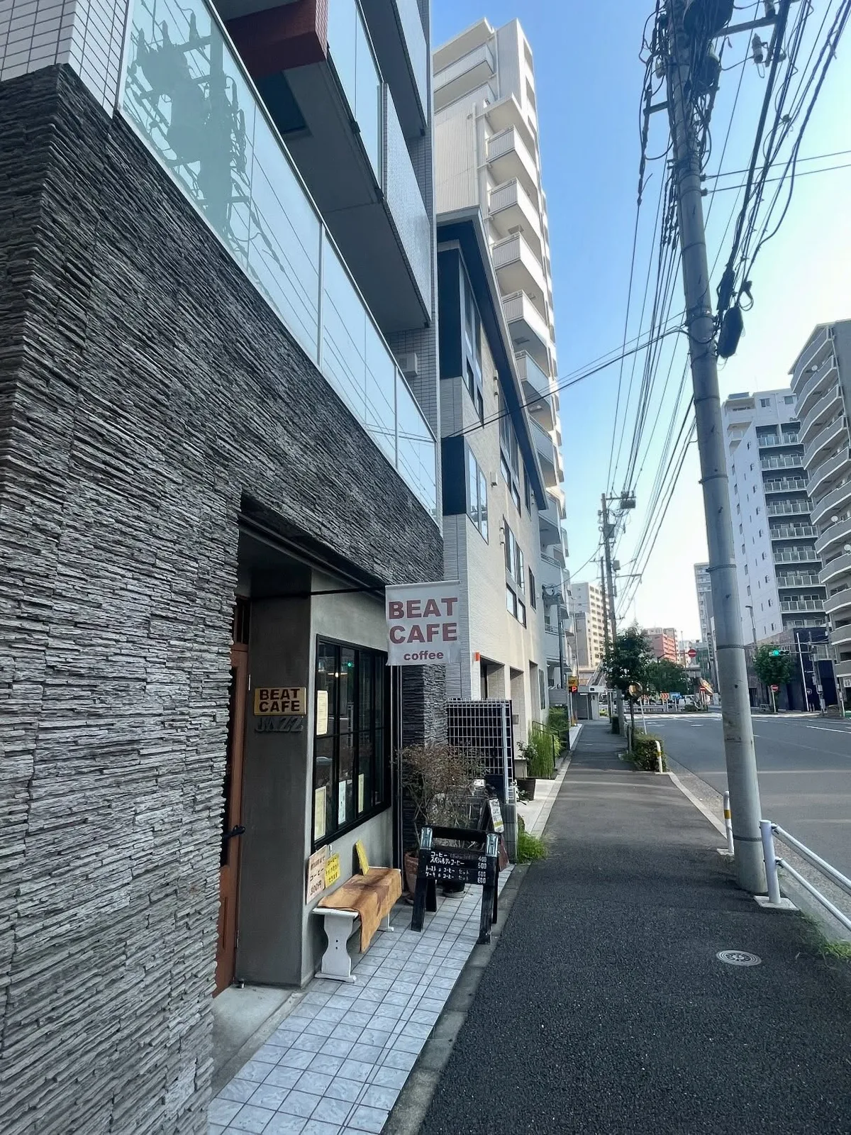 Photo by Koichi Tanaka on August 01, 2026. May be an image of signboard, street, telephone pole, buildings and text.