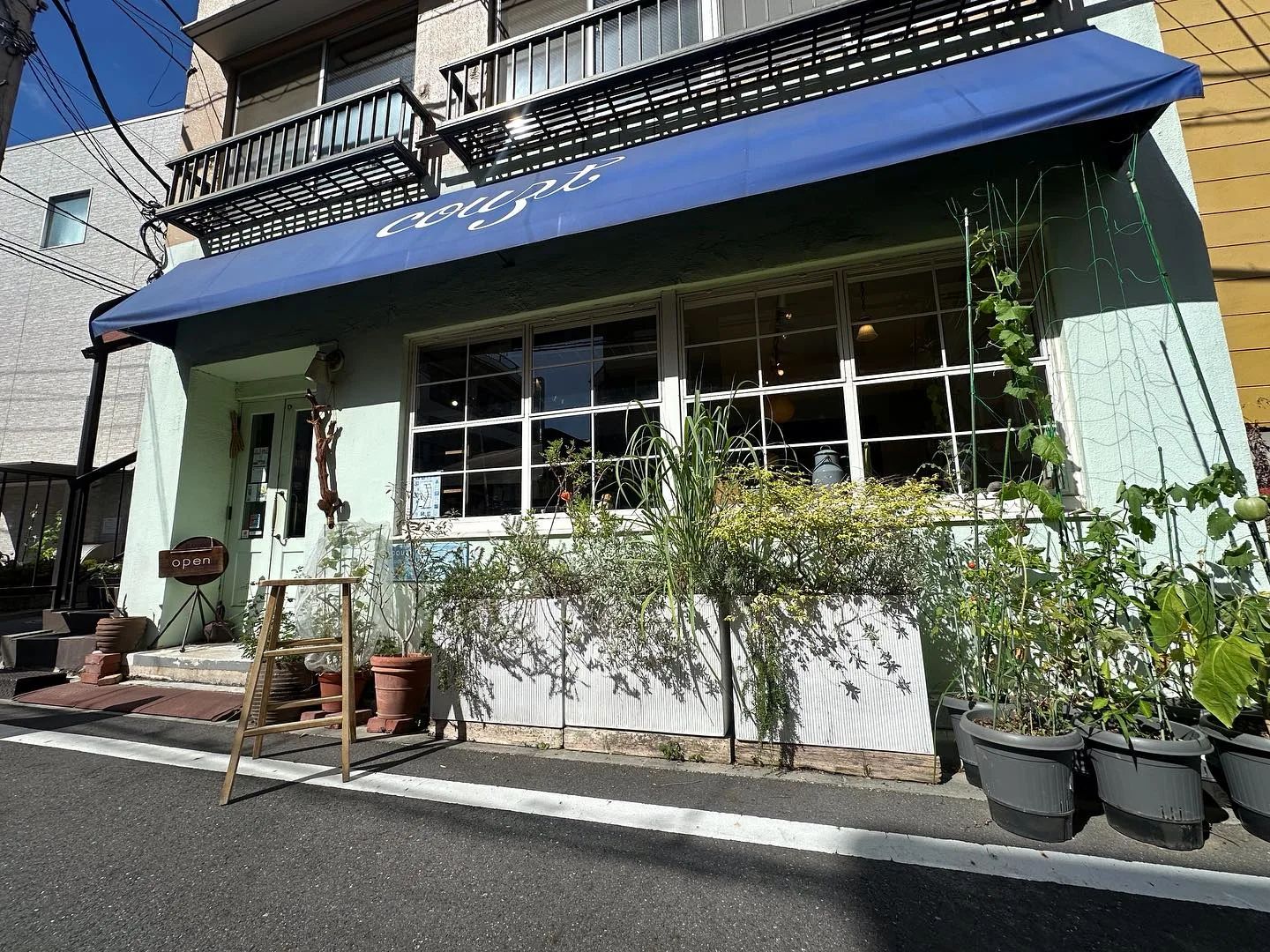 Photo by COUZT CAFE + SHOP in COUZT CAFE ＋ SHOP. May be an image of signboard, outdoors and text.