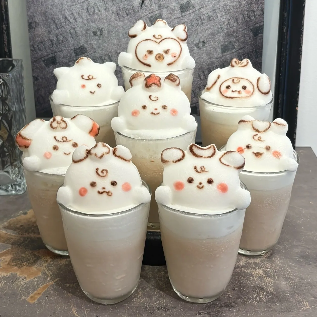 Photo by HATCOFFEE on August 05, 2026. May be an image of snowman, smoothie, whipped cream, marshmallow and text.