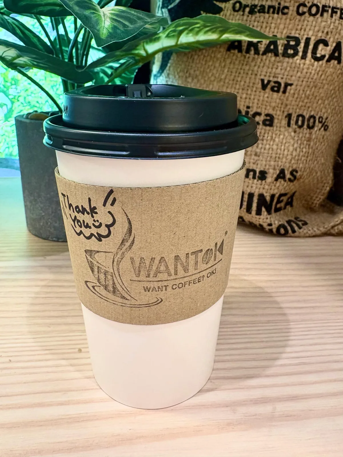 Photo shared by WANTOK®︎越谷レイクタウン店【公式】 on August 06, 2026 tagging @kizuna.wantok, and @wantok.tokyo. May be an image of ‎coffee cup, coffee, cappuccino, cup and ‎text that says '‎ABIC hank ل WANTOK WANT COFFEE? COFFEETOK OKI‎'‎‎.