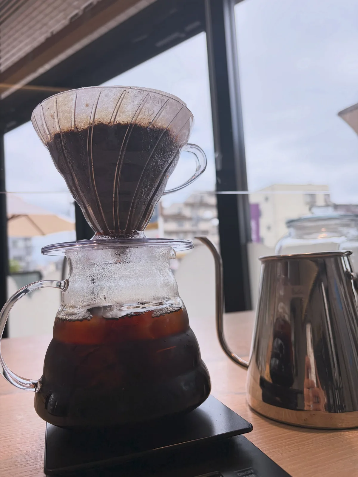 Photo by arcocoffee on July 27, 2026. May be an image of coffee maker, coffee cup, carafe, cornflower and text.