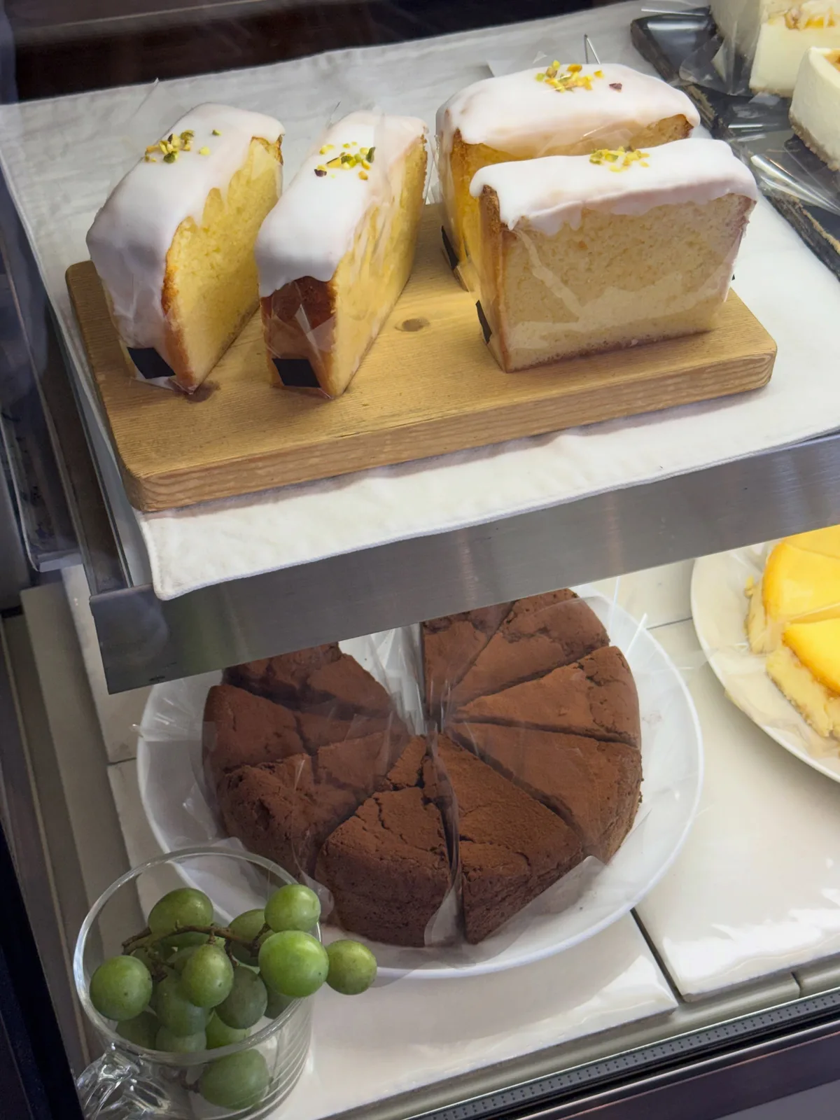 Photo by Cafe Shibaken on July 18, 2026. May be an image of chiffon cake, bread, tart and text.